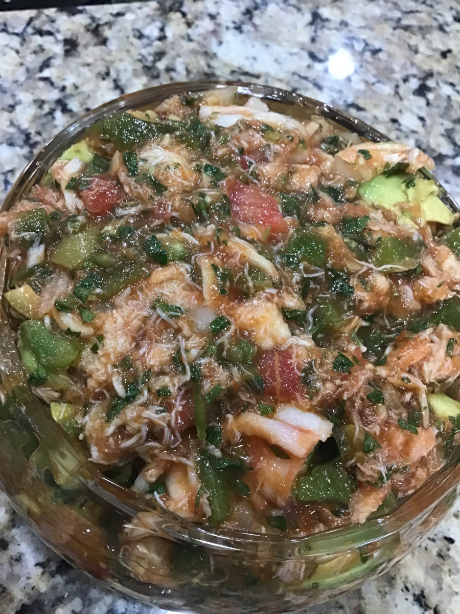 A spicy seafood party dip, served with tortillas chips.