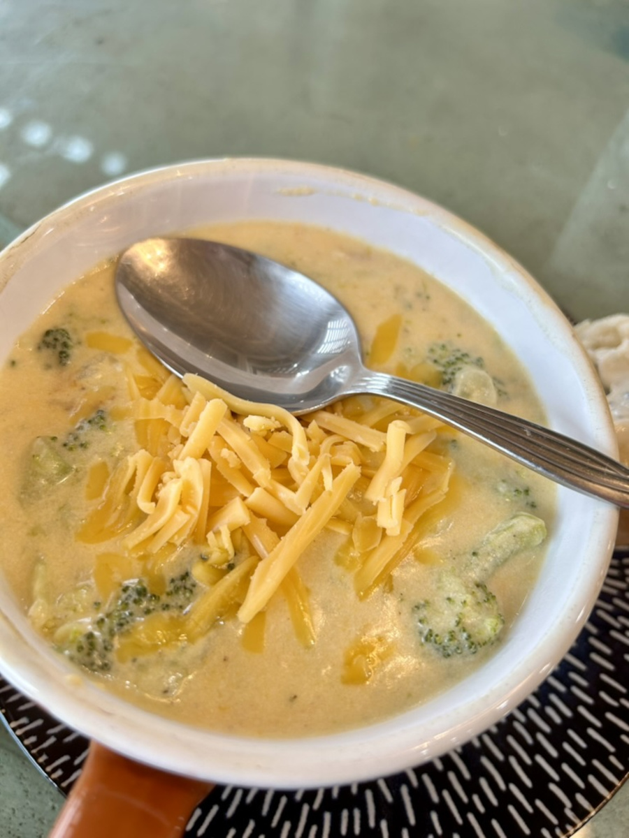 Serve Broccoli Cheese Soup with a knob of herb-buttered French bread