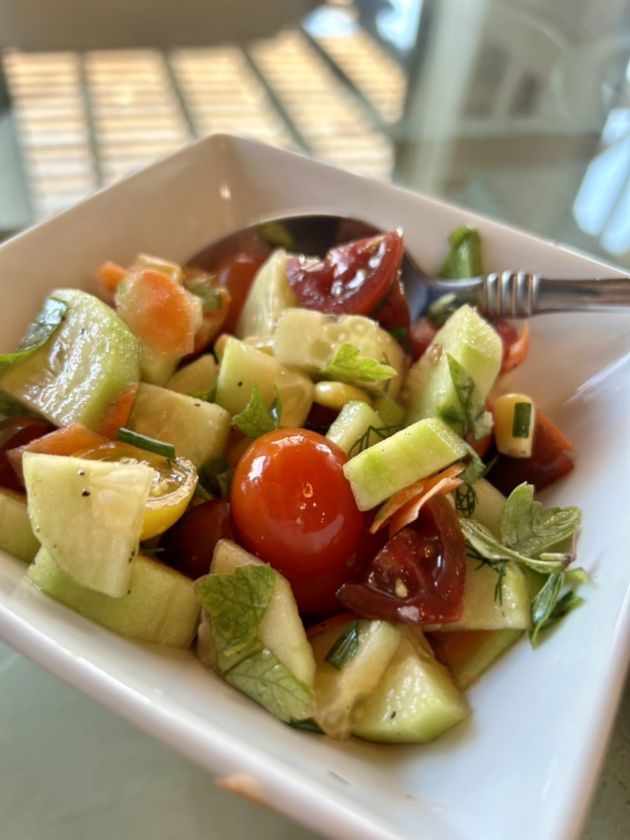 Cucumber Tomato Relish - Cucumber pieces, cherry tomato halves, corn kernels, flat leaf parsley, chives, tossed in basil flower vinegar.