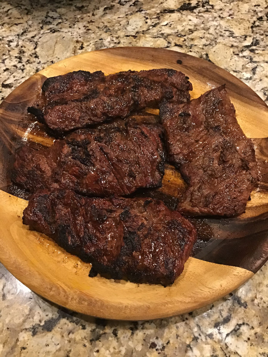 Fajitas Arracheras - resting on a wooden platter