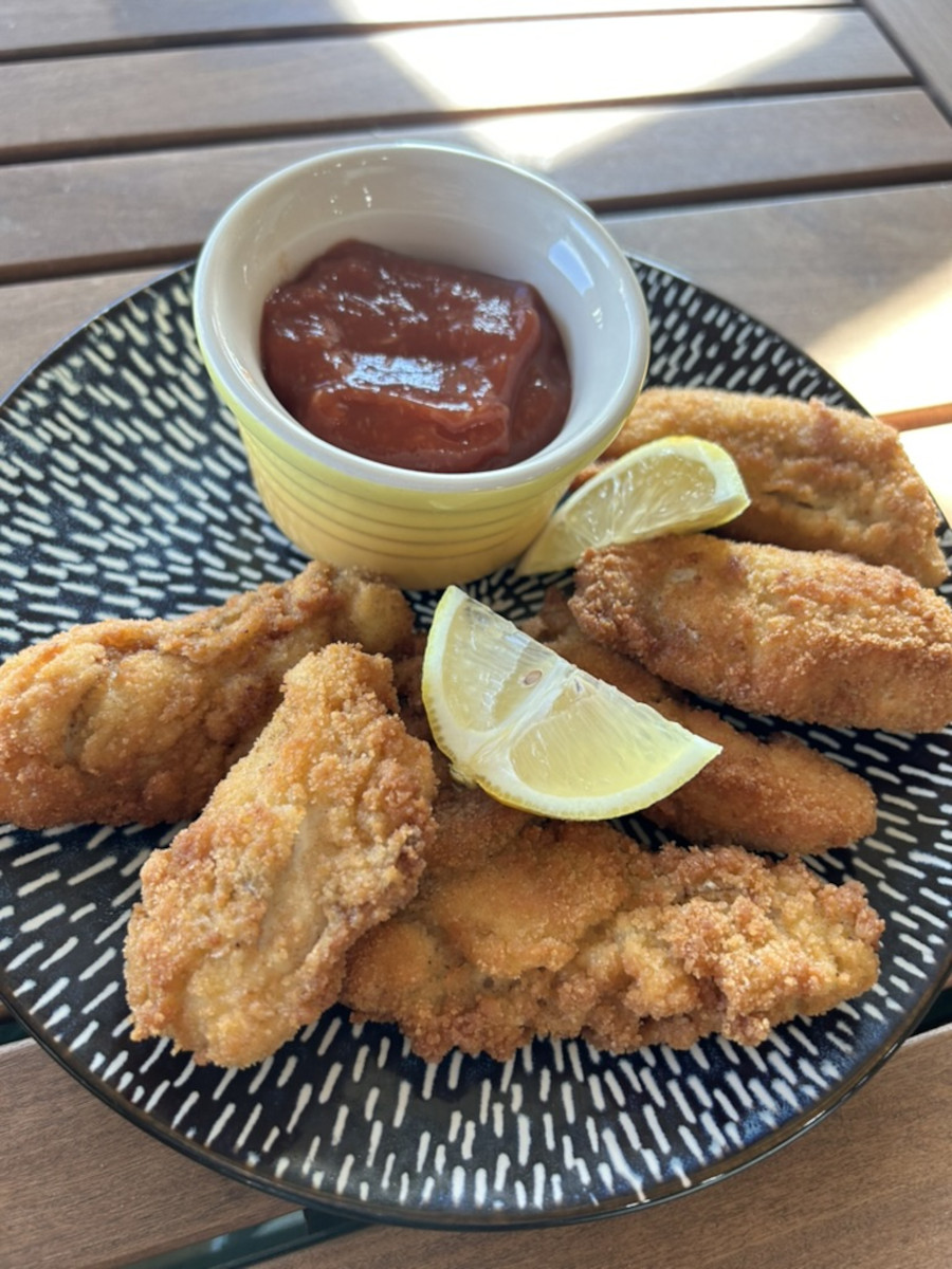 Fried Oysters - served with wedges of lemon and a ramekin of Cajun Red Sauce.