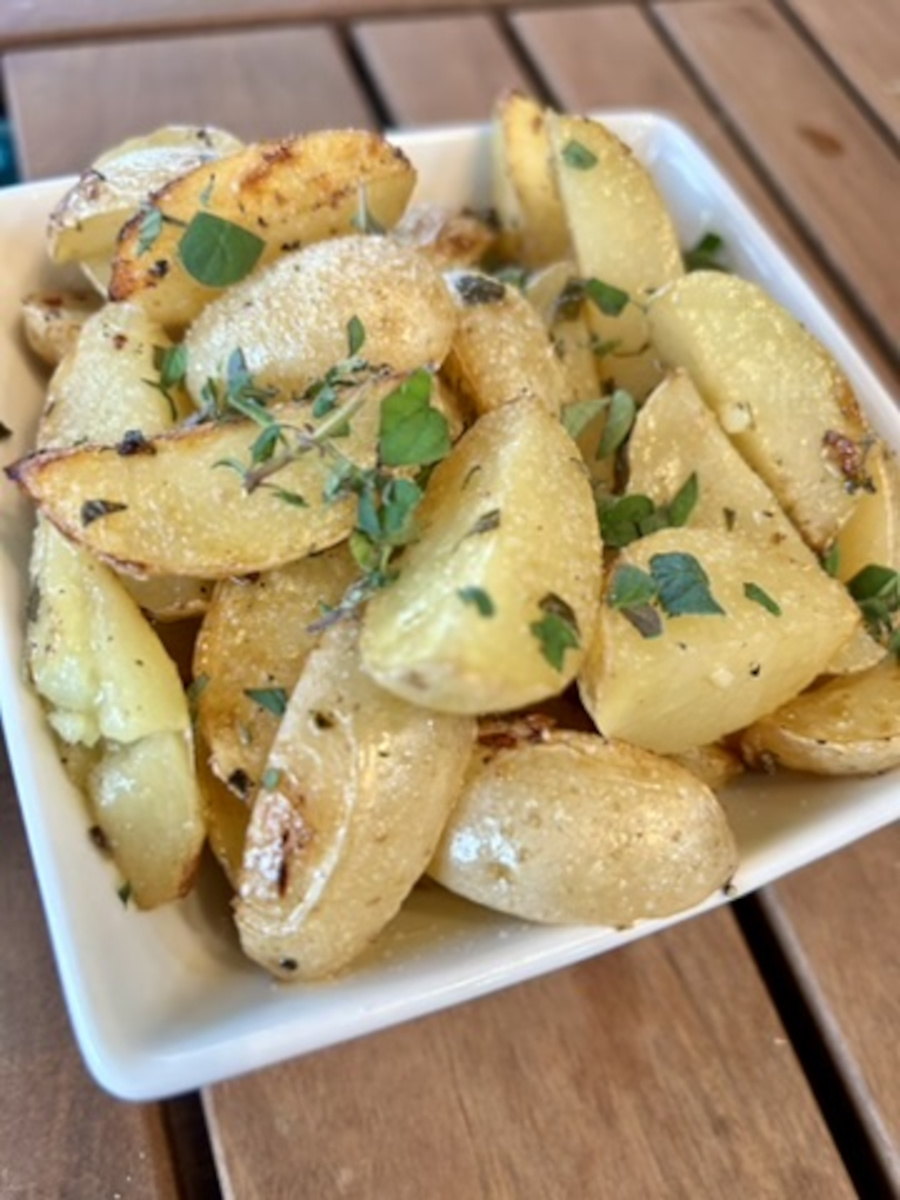 Roasted Greek Lemon Potatoes - top with remaining chopped fresh oregano and serve.