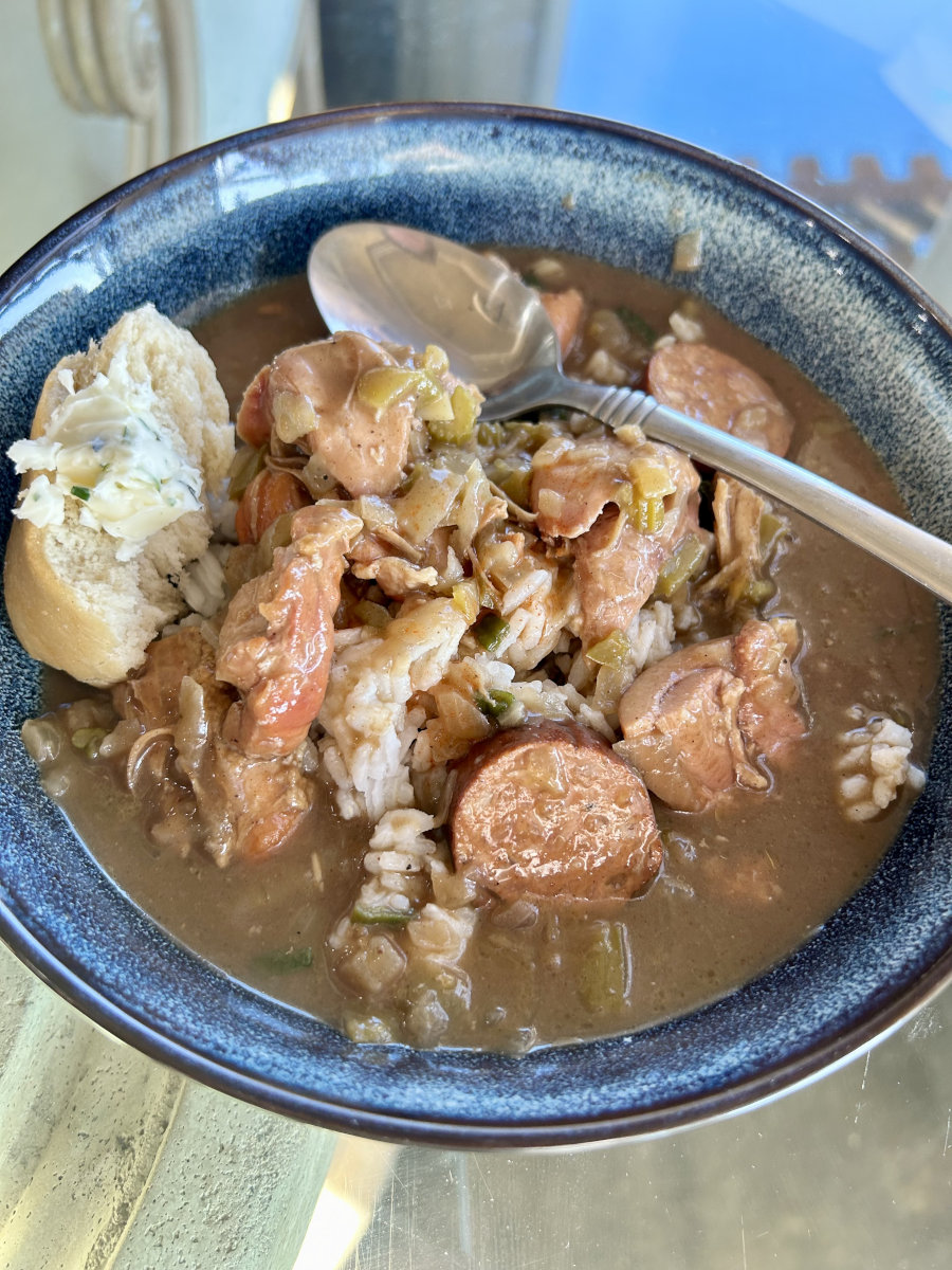 Smoked chicken and sausage gumbo with buttered French bread.