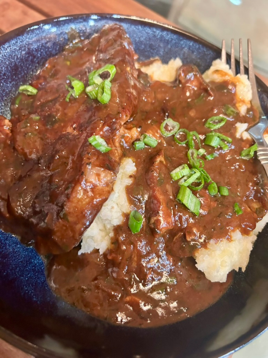 Smothered Coppa Steak - serve over mashed potatoes.