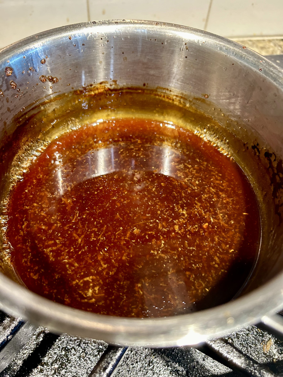 Teriyaki Sauce - Teriyaki sauce simmering in a sauce pan.