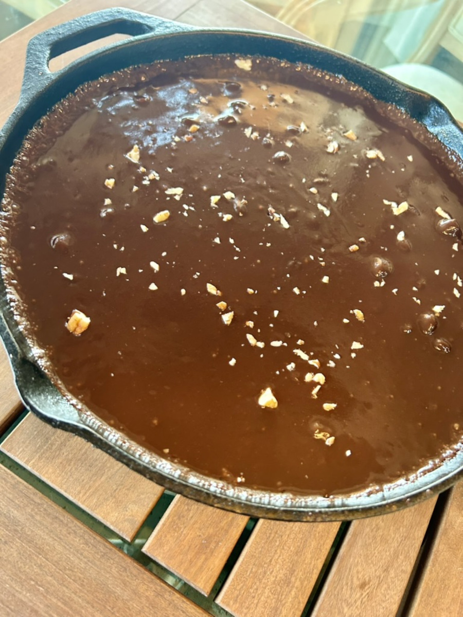 Texas Skillet Cake - pour warm frosting over warm cake. Top with chopped pecans.